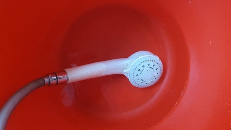 limpieza de baño - cabezal de ducha